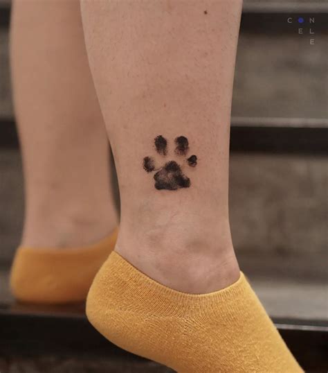 11 Cute Paw Print Tattoo Designs Ideas You Must Love Pawprint Tattoo