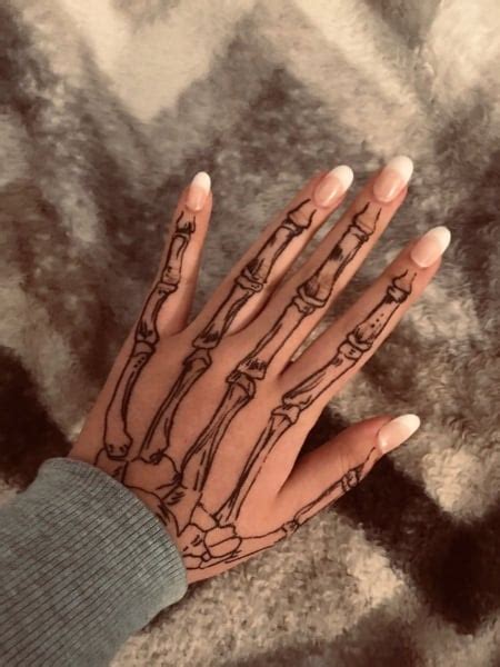 20 Cool Skeleton Hand Tattoo Ideas Meaning The Trend Spotter
