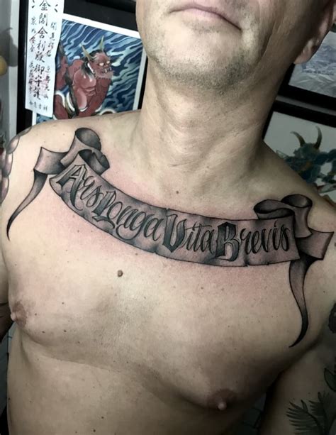 23 Script Tattoo On Chest Harleiclare