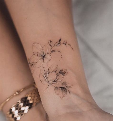 30 Delicate Flower Tattoo Ideas Mybodiart 30 Delicate Flower Tattoo Ideas Mybodiart