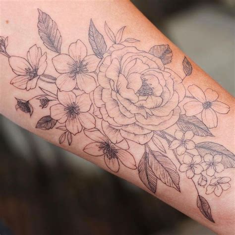 31 Floral Tattoo Designs That Are Both Pretty And Meaningful See