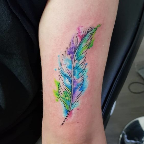 40 Inspiring Feather Tattoos To Show Off Your Creative Spirit
