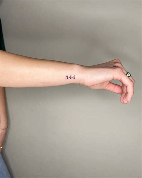 444 Lettering Tattoo Located On The Wrist