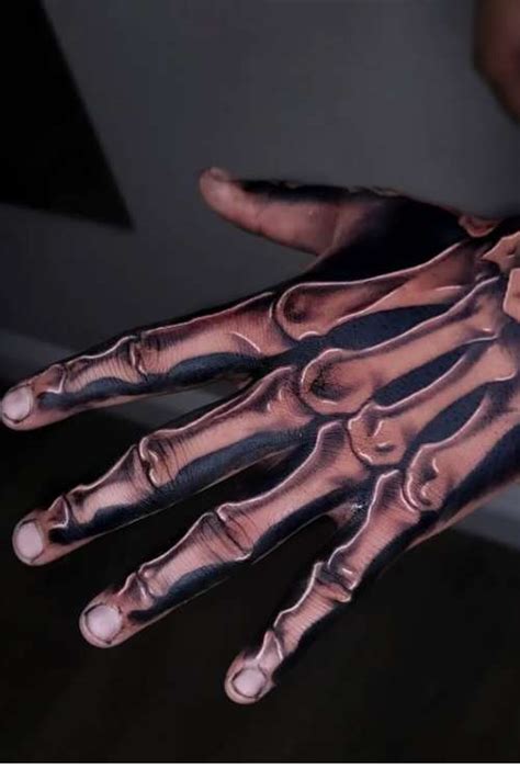 60 Skeleton Hand Tattoo Ideas With Meaning
