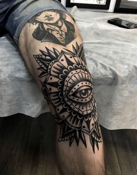Above Knee Tattoo Ideas for Men: Bold & Striking Designs