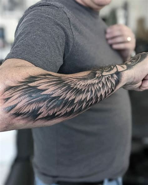 Angel Wing Arm Tattoos: Stunning Design Ideas