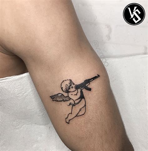 Angel With AK-47 Tattoo: Meaning & Design Ideas