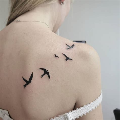 Bird Tattoo On Back Of Shoulder