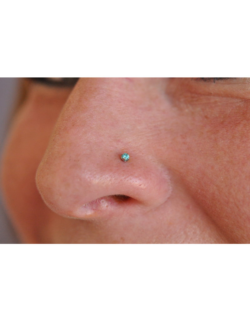 Center Lip Piercing By Bree With A Mint Green Cz From Neometal
