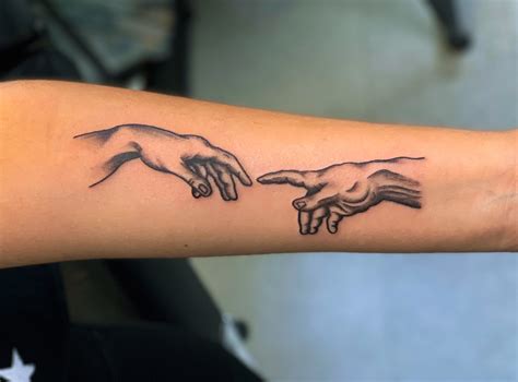 Unveiling the Creation of Adam Tattoo Meaning