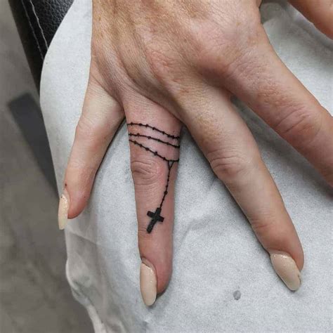 Cross Tattoo In Finger: Meaning & Design Ideas