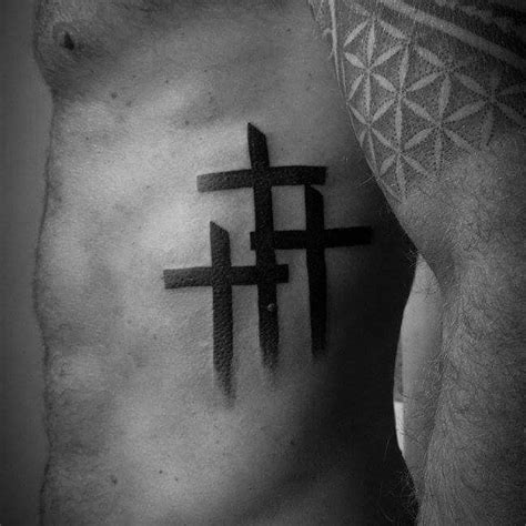 Cross Tattoo On Ribs: Design Ideas & Pain Guide