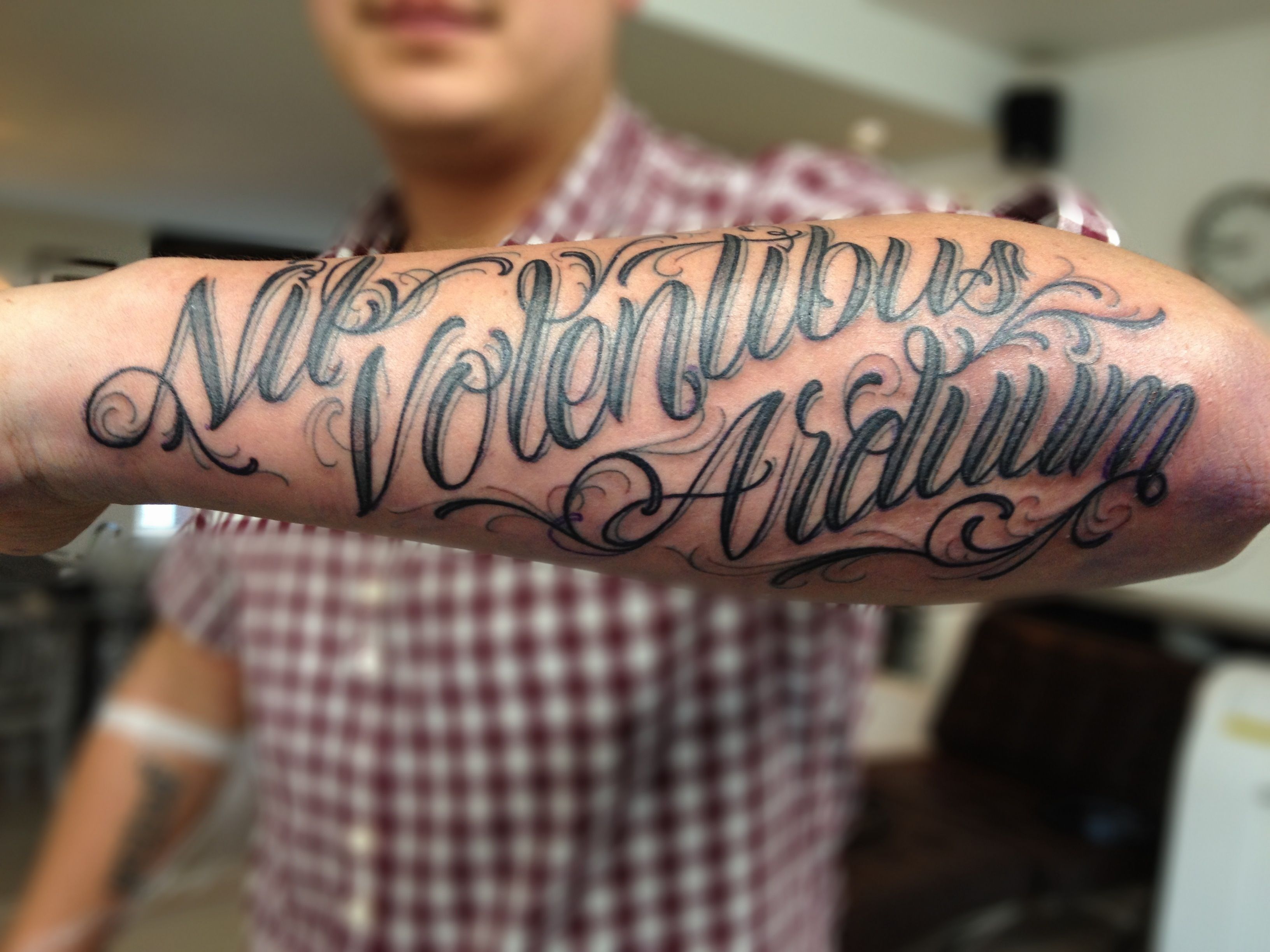Cursive Forearm Tattoos