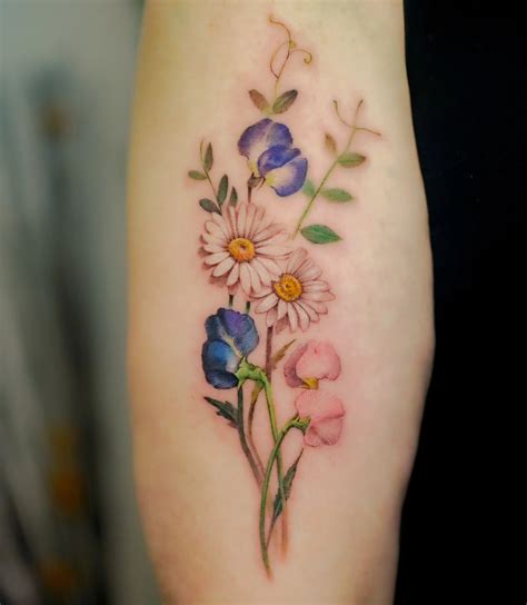 Daisy and Sweet Pea Tattoo Ideas: Delicate Floral Ink Inspiration