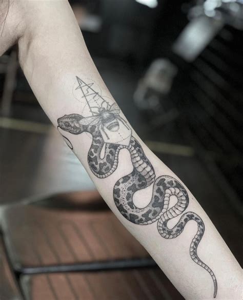 Detailed Dotwork Snake Bicep Tattoo Design By Mantas Zorys Of Marked