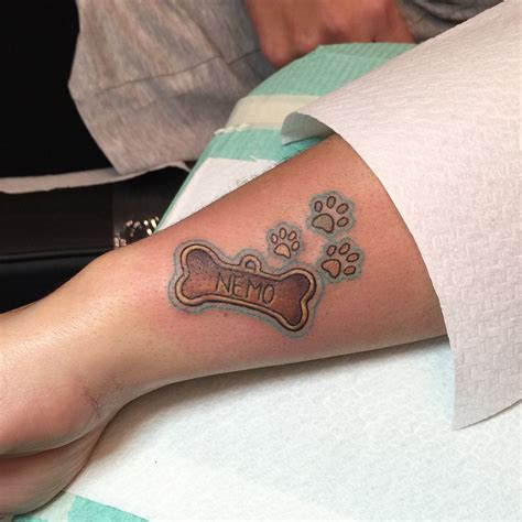 Dog S Love Paws And Bone Dog Tattoos Paw Tattoo Tattoos Dog S Love Paws And Bone Dog Tattoos Paw Tattoo Tattoos