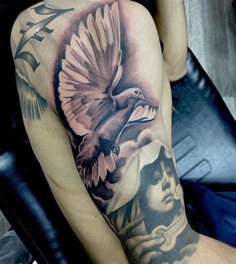 Dove Tattoos With Clouds: Elegant Design Ideas
