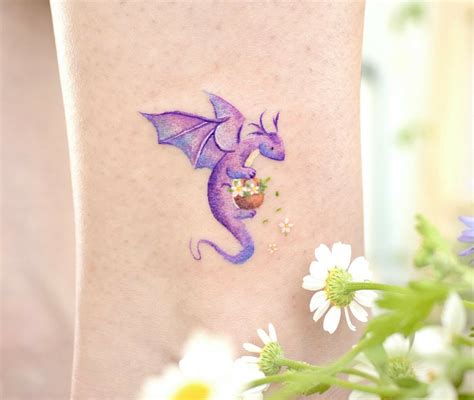 Dragon With Flowers Tattoo In 2020 Small Dragon Tattoos Dragon