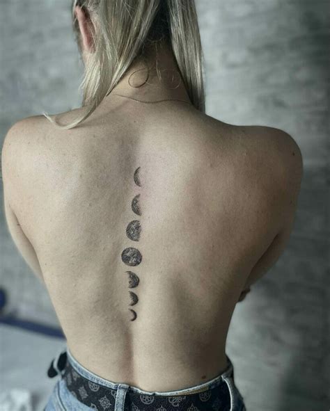 Elegant Moon Phases Tattoo Spine Design Ideas