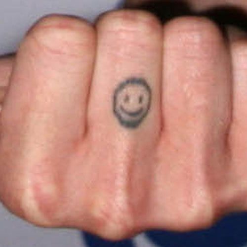 Evil Smiley Face Tattoo: Meaning & Design Ideas