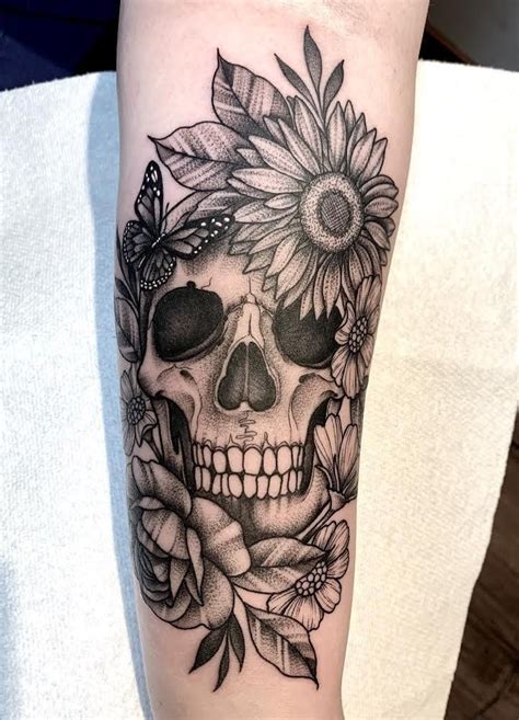 Girly Skull Tattoos With Flowers: Feminine & Bold Designs