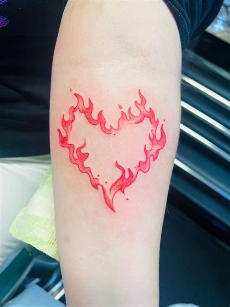 Heart With Flames Tattoo: Meaning & Design Ideas