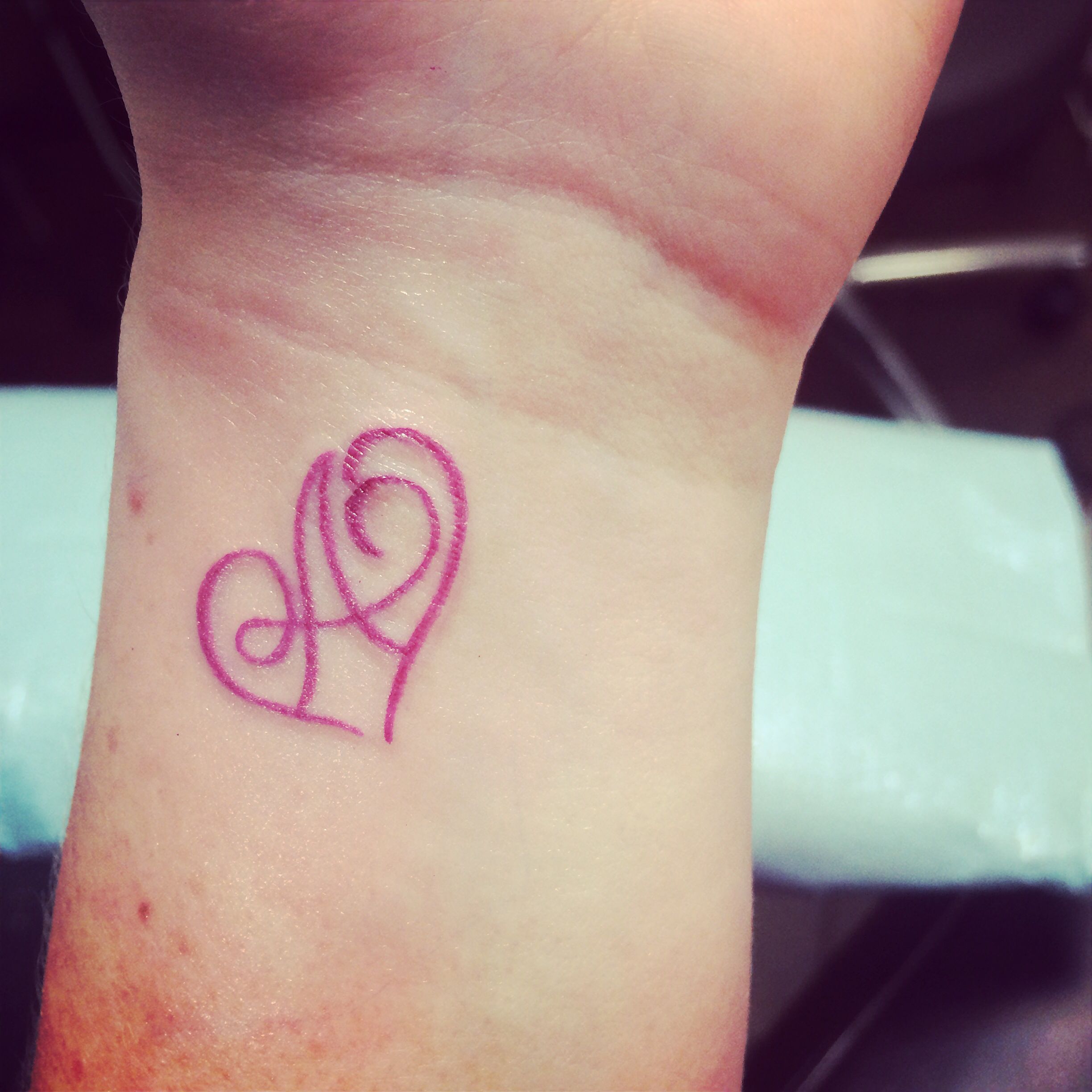 Heart With Initials Tattoo: Trendy & Meaningful Design Ideas