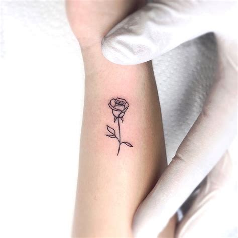 If You Re Considering Getting A Small Rose Tattoo On Your Body See The