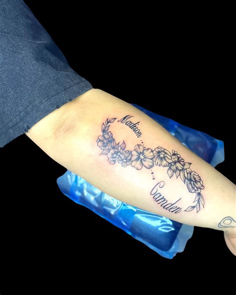 Infinity Tattoos With Names And Flowers