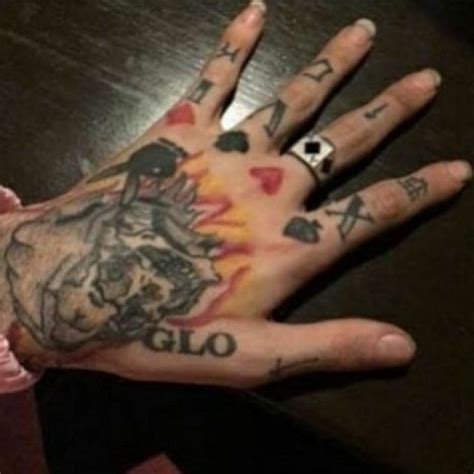 Lil Peep's Iconic Hand Tattoos: Meanings & Designs