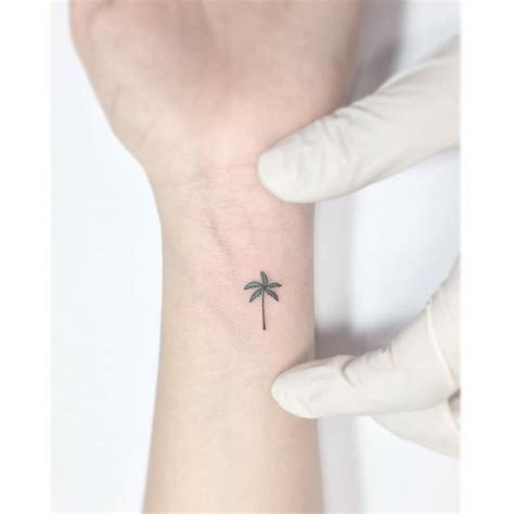 Minimalist Palm Tree Tattoo On The Left Inner Wrist Tattoo Wrist
