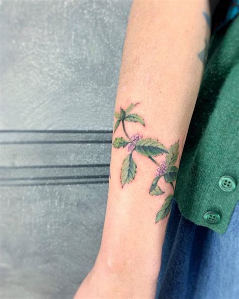 Mint Tattoo On The Right Forearm