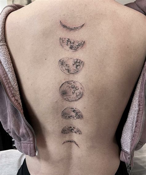 Moon Phases Spine Tattoo: Celestial Ink Inspiration