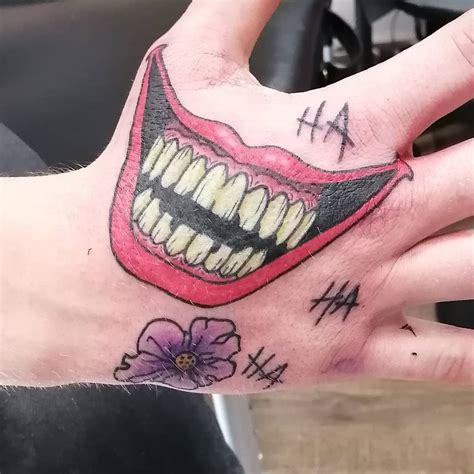 Mouth Tattoo On Hand Joker: Bold & Unique Design Ideas