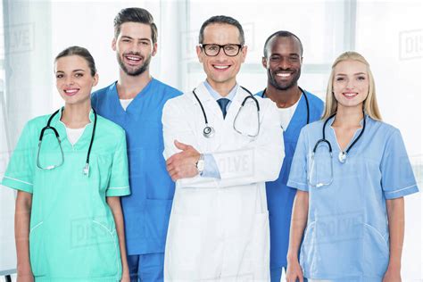 Multiethnic Team Of Doctors Looking At Camera Stock Photo Dissolve