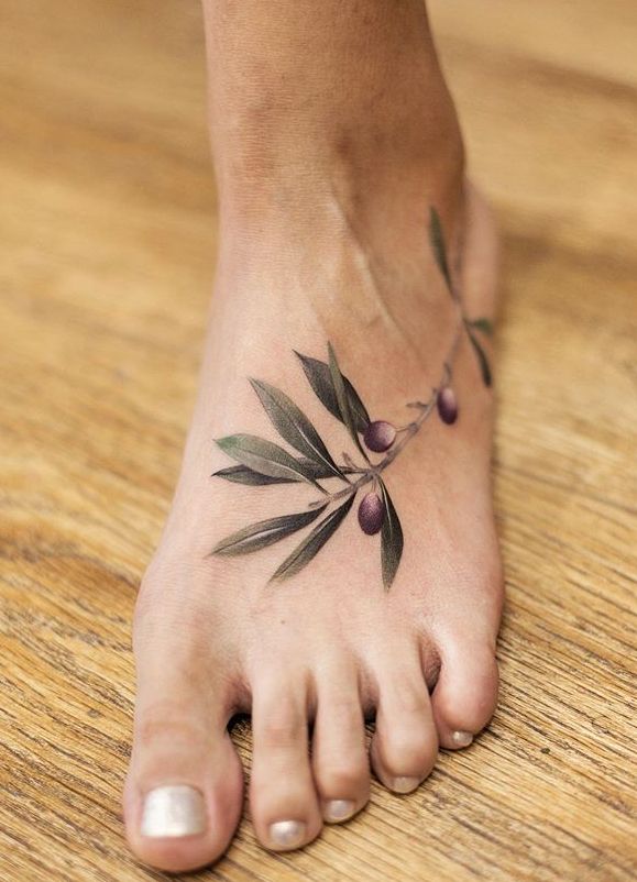 Olive Branch Tattoo Meaning Symbolism Explained Designs In 2024