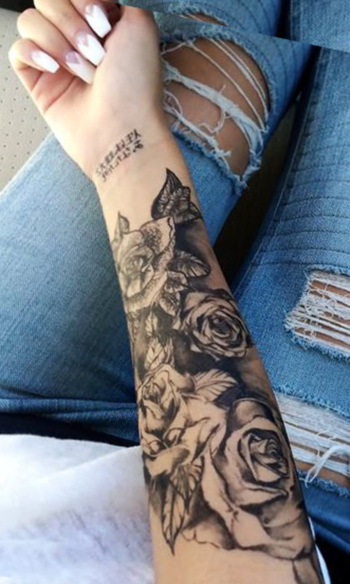 Rose Tattoo Lower Arm Design Ideas & Inspiration