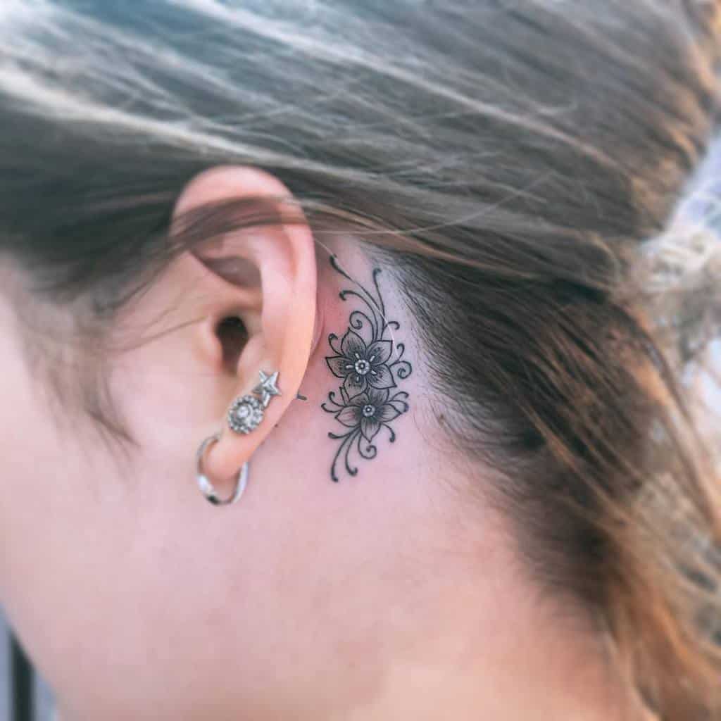 Simple Lotus Flower Tattoo Behind Ear