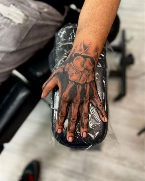 Skeleton Hand Tattoos 50 Terrific Ideas With Meanings 2022