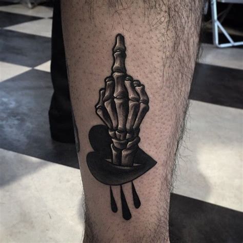 Skeleton Middle Finger Tattoo Ideas & Meanings