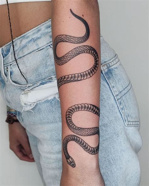 Snake Around Arm Tattoo: Stunning Design Ideas & Meanings
