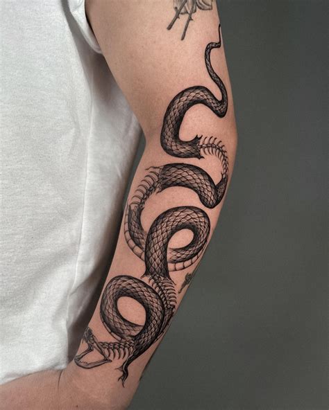 Snake Bicep Wrap Tattoo: Striking Design Ideas