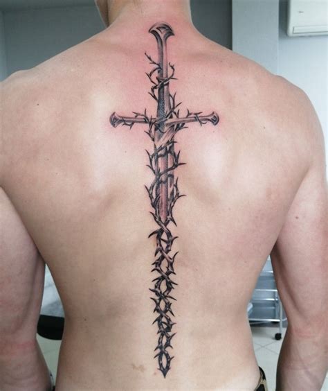 Sword Tattoo On Back: Bold Designs & Meanings Explained