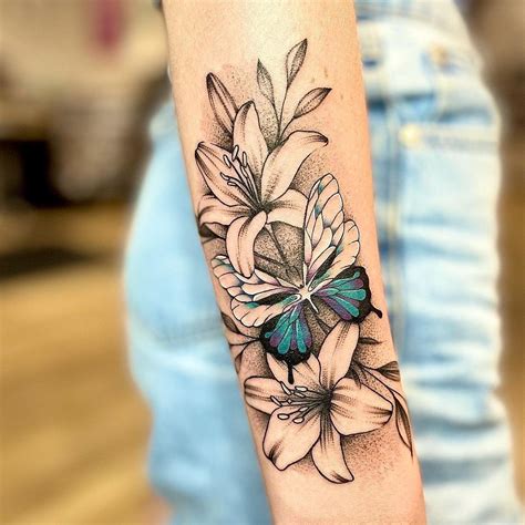 Lilies and Butterflies Tattoo Ideas: Beauty and Meaning Explained  
Elegant Lily and Butterfly Tattoos: Inspiration and Designs  
Symbolic Tattoos: Lilies and Butterflies for Timeless Beauty  
Butterfly and Lily Tattoos: Perfect Blend of Nature and Art  
Meaningful Tattoos: Lilies and Butterflies for Personal Expression