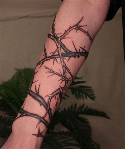 Tattoos Of Vines And Thorns