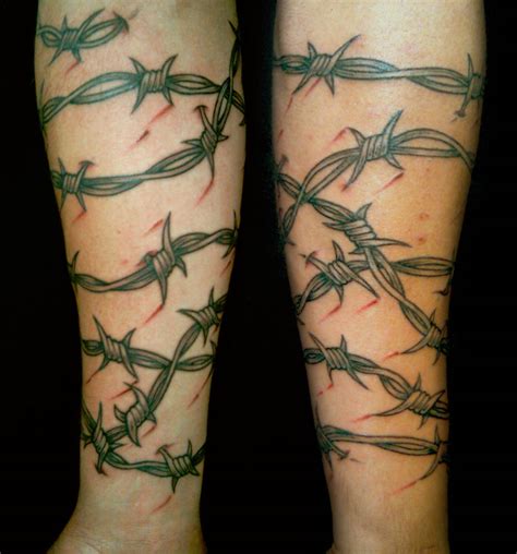 Understanding The Significance And Meaning Of Barbed Wire Tattoos