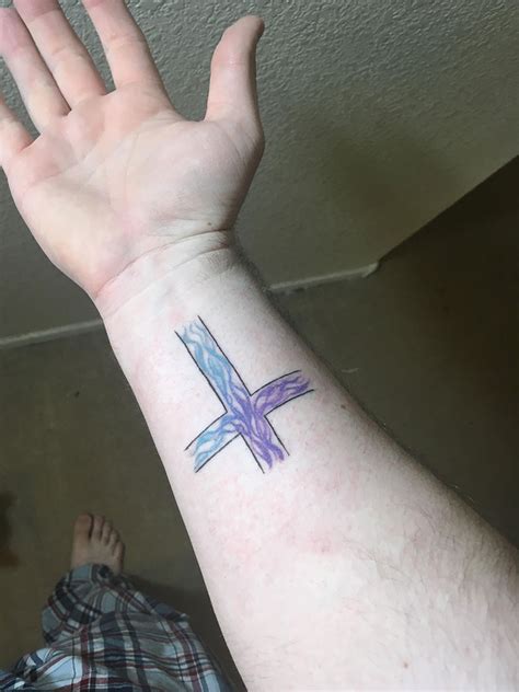 Upside Down Cross Tattoo Meaning Symbolism Wisdom Of The Spirit